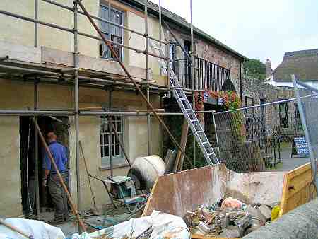 The roadside view of the cottage adjoining the Finch Foundry