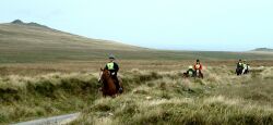 Riding past Yes Tor on Dartmoor