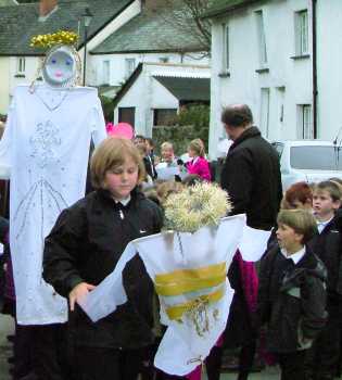 Puppets move in procession